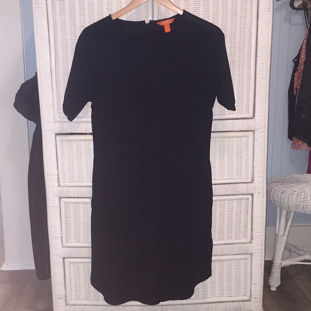 Black dress. Great for all occasions. High-low hem